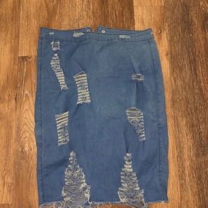 Denim ripped skirt.